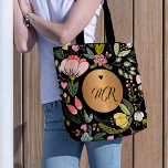 Luxury black and pastel pink floral monogram tote bag<br><div class="desc">Glam girly chic tote bag featuring a chic pastel wildflower meadow pattern and a copper brass gold round label and a little heart over moody black background.          Personalize it with your monogram name initials!</div>