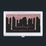 Luxury Black and Rose Gold Sparkle Glitter Drips Business Card Holder<br><div class="desc">Rose Gold Sparkle Glitter Drips Luxury Business Card Case featuring faux glitter dripping in blush pink, rose gold luxury on a classic black background. You're dripping in luxury, so your business cards should be, too! Easy to customize! Feel free to contact us at cedarandstring@gmail.com if you need assistance with the...</div>