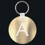 Luxury Gold Faux Stainless Steel Monogram Keychain<br><div class="desc">Luxury Gold Faux Stainless Steel Metallic Elegant Keychain. These Keychains can be customized to include your initial and first name. These key chains make great birthday,  bridal shower or bachelorette party favors.</div>