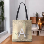 Luxury Gold Glitter Sparkle Elegant Monogram Tote Bag<br><div class="desc">Luxury Gold Faux Sparkle and Dripping Glitter Metallic Stainless Steel Foil Elegant Monogram Book Bag. This Book Bag can be customized to include your initial and first name and given as a gift for Christmas,  Sweet 16,  18th,  21st,  30th,  40th,  50th,  or 60th Birthday,  Bridal Shower or a Wedding.</div>