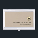 Luxury Gold Monogram Beige Business Card Holder<br><div class="desc">Simple modern design with luxury brushed metallic gold monogram medallion with personalized name and title or custom text below in classic block typography on a solid beige background. Personalize for your custom use.</div>