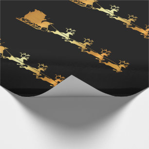 Luxury gold Santa on black X-mas wrapping paper