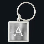 Luxury Silver Faux Stainless Steel Monogram Keychain<br><div class="desc">Luxury Silver Faux Stainless Steel Metallic Elegant Keychain. These Keychains can be customized to include your initial and first name. These key chains make great birthday,  bridal shower or bachelorette party favours.</div>