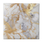 Luxury style white and gold marble effect tile<br><div class="desc">You can add a touch of luxury to your home with these white and gold marble effect ceramic tiles. The intricate veining detail and elegant colour palette, enhanced with splashes of gold, create a sophisticated and timeless seamless design. This makes them perfect for any modern home and ideal for adding...</div>