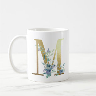 M,  golden initial with blue floral foliage coffee mug