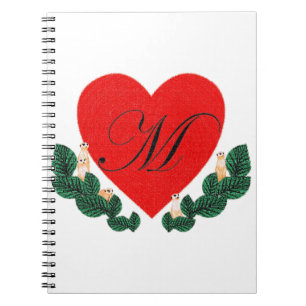 M in a heart notebook