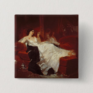 Macaron Carré 5 Cm Femme sur un sofa rouge