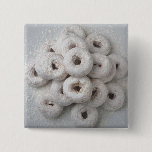 Macaron Carré 5 Cm Plan rapproché des beignets en poudre dans un pla