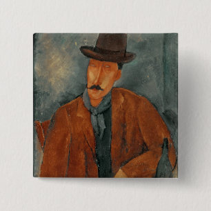 Macaron Carré 5 Cm Un homme assis se penchant sur une table