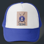 Maccabee Shield And Spears Trucker Hat<br><div class="desc">A depiction of a Maccabee's shield and two spears hanging on a wall. Battle worn and rusty, but still serviceable. The shield is adorned by a lion and text reading "Yisrael" (Israel) in the Paleo-Hebrew alphabet. "Maccabee" also appears in modern Hebrew. The Maccabees were Jewish rebels who freed Judea from...</div>