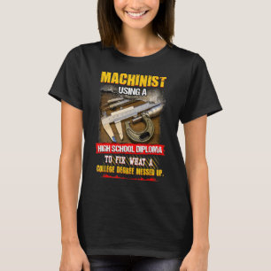 Machinist Using A High School Diploma To Fix T-Shirt