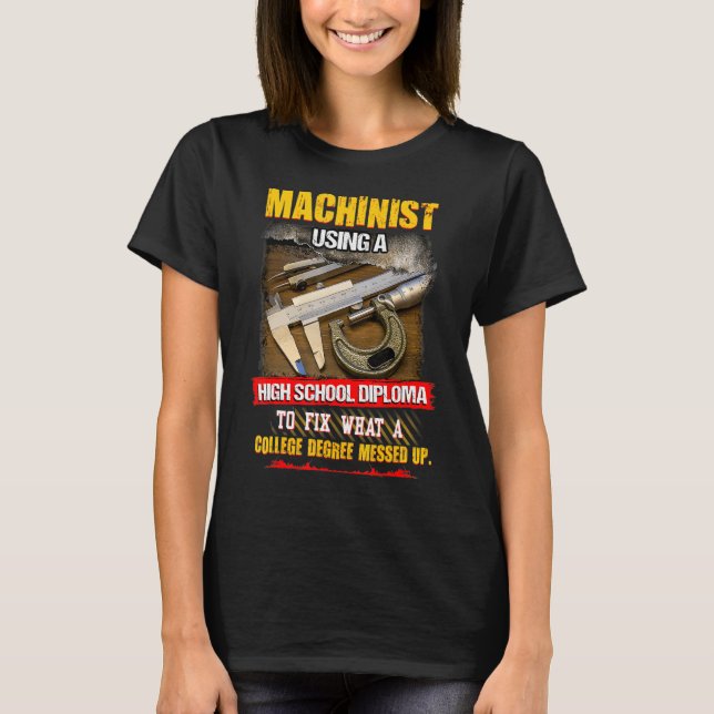 Machinist Using A High School Diploma To Fix T-Shirt (Front)