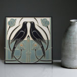 Mackintosh Black Birds Art Deco Nouveau Wall Decor Tile<br><div class="desc">This ceramic tile features two black birds and intricate floral patterns reminiscent of the iconic style of Mackintosh. He was a prominent Scottish architect, designer, and artist of the Art Nouveau movement. Clean lines, geometric shapes, and a strong sense of symmetry characterize his work. These elements are beautifully represented in...</div>