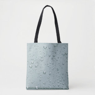 Macro shot of water drops tote bag