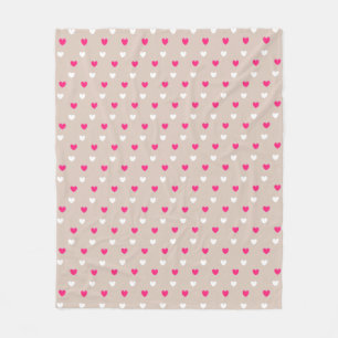 Magenta red and white hearts on beige fleece blanket