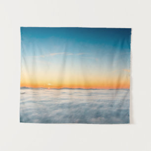 Magical sunrise above clouds tapestry