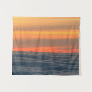 Magical sunset above the clouds tapestry