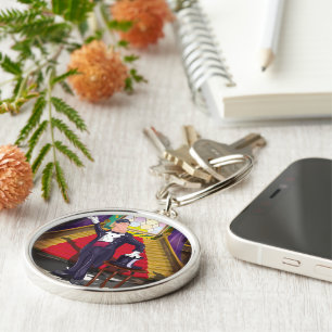 Magician performing magic trick on stage keychain