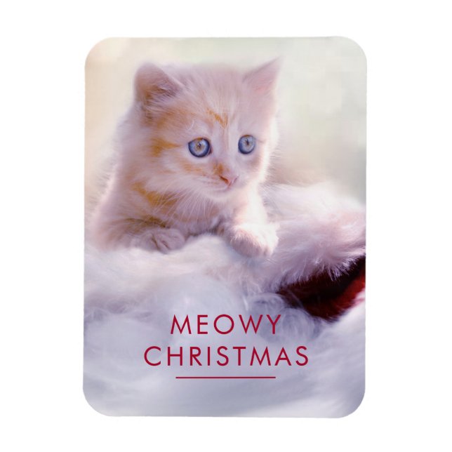 Magnet Flexible Petit Kitten reposant sur un chapeau de Noël Meowy (Vertical)
