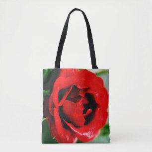 Magnificent red rose with morning dew drops  tote bag