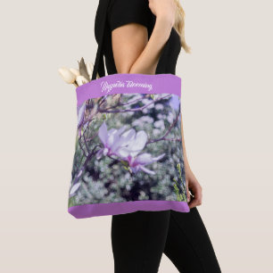 Magnolia blooming tree tote bag