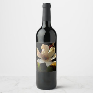 Magnolia flower on black background Wine bottle Label