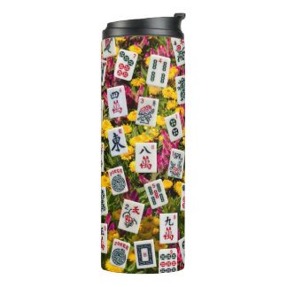 Mahjong symbols on wildflowers background thermal tumbler