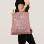Maid of Honour Pink Glitter Bridal Shower Tote Bag<br><div class="desc">Maid of Honour  Rose Gold Blush Pink Faux Glitter and Sparkle Hand Lettered Brushed Typography Bridal Shower Party Bag. This Maid of Honour bag can be customized with the Maid of Honour's name in a silver and white elegant typography.</div>