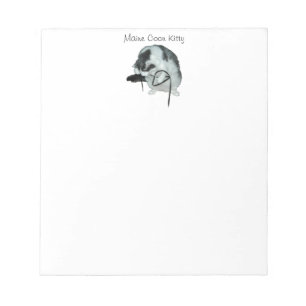 Maine coon cat playing Notepad