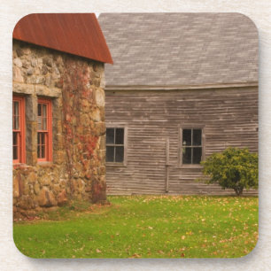Maine, Old stone building and wooden barn in Coaster