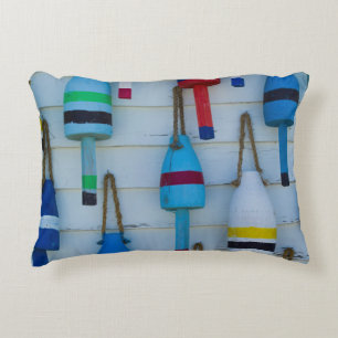 Maine, Stonington, decorative lobster buoys Pillow