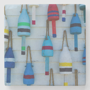 Maine, Stonington, decorative lobster buoys Stone Coaster