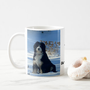 Majestic Bernedoodle dog on snow covered hill Mug
