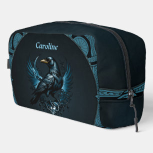 Majestic black raven sitting on an ornate dopp kit