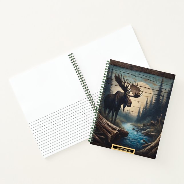 Majestic moose beside a tranquil river at dusk notebook (Inside)
