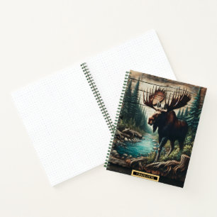 Majestic moose standing by a serene forest river notebook