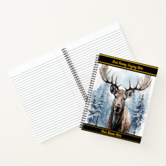 Majestic moose standing proudly in a snowy forest notebook
