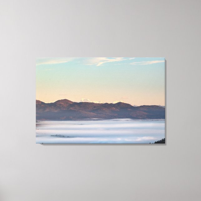 Majestic mountain Triglav with fog in valley Canvas Print (Front)