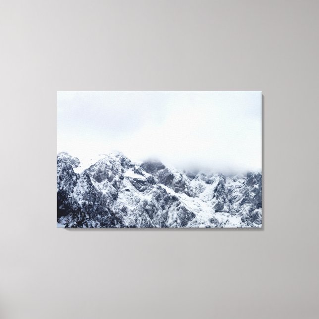 Majestic mountains below clouds canvas print (Front)