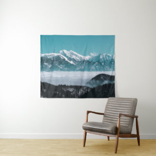 Majestic mountains rising over foggy valley tapestry