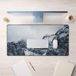 Majestic mountains under the clouds desk mat