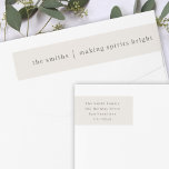 Making Spirits Bright | Natural Neutral Christmas Wrap Around Label<br><div class="desc">Stylish modern holiday wrap around address label with a classic typography quote "making spirits bright" with a dividing line and family name in white. The design features a neutral natural soft taupe ivory cream colour. The address, greeting and name can be easily customized for a design as unique as your...</div>