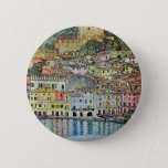 Malcesine on Lake Garda By Gustav Klimt 2 Inch Round Button<br><div class="desc">Malcesine on Lake Garda (1913) by Gustav Klimt is a vintage Victorian Era Art Nouveau fine art symbolism painting. A beautiful view of the Italian city of Malcesine with buildings and houses on the edge of the harbour. The homes and boats cast a reflection in the calm water. You can...</div>
