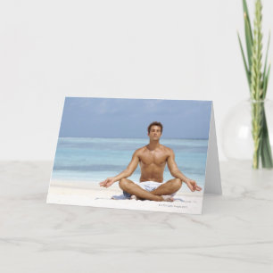 Maldives, Handsome young man meditating in a Card