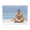 Maldives, Handsome young man meditating in a