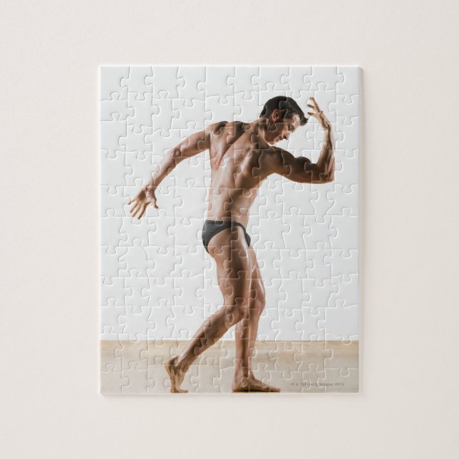 Male body builder flexing and posing 2 jigsaw puzzle (Vertical)