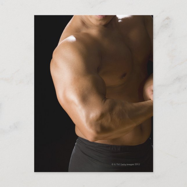 Male bodybuilder flexing muscles, front view, 2 postcard (Front)