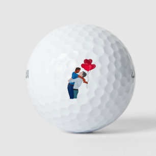 Male Couple Hugging While Holding Heart Shaped Bal Golf Balls