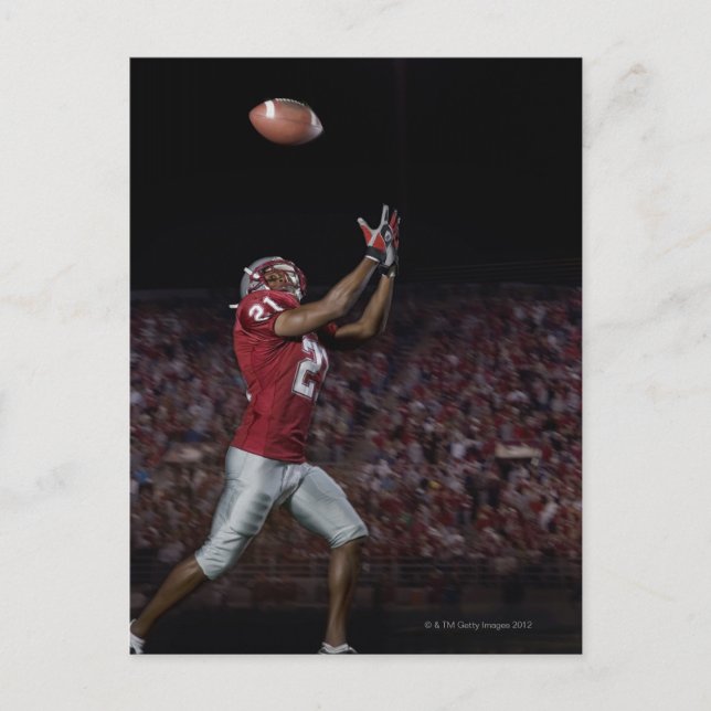 Male football player catching football postcard (Front)