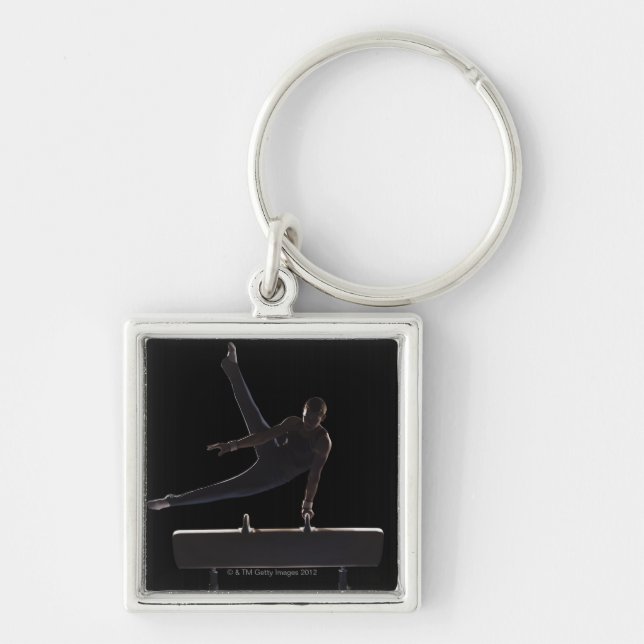 Male gymnast on pommel horse keychain (Front)